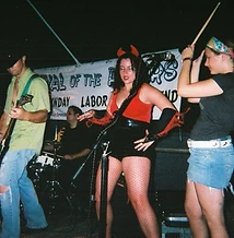 Live band performing on the outdoor stage at night at JescoFest 2006