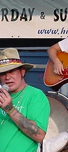Jesco White singing and J. Glenn playing guitar together on the Sunday stage at JescoFest 2006