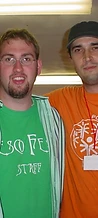 Jesco Fest staff member in green shirt posing with a friend at JescoFest 2006