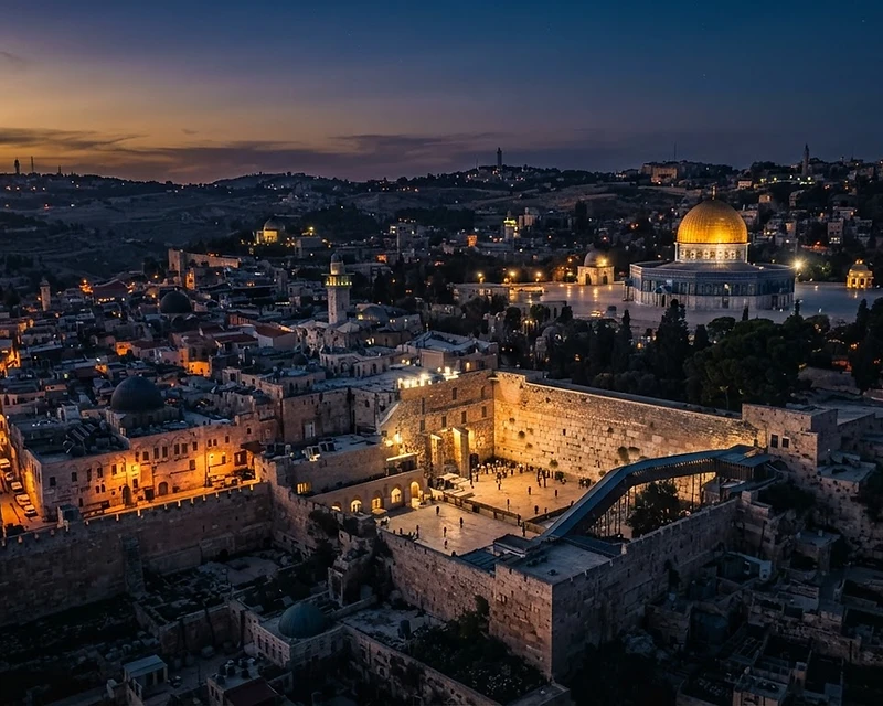 Cinematic aerial view of Jerusalem at dusk — the Dome of the Rock and the Western Wall