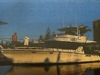 Motor yacht docked at a marina