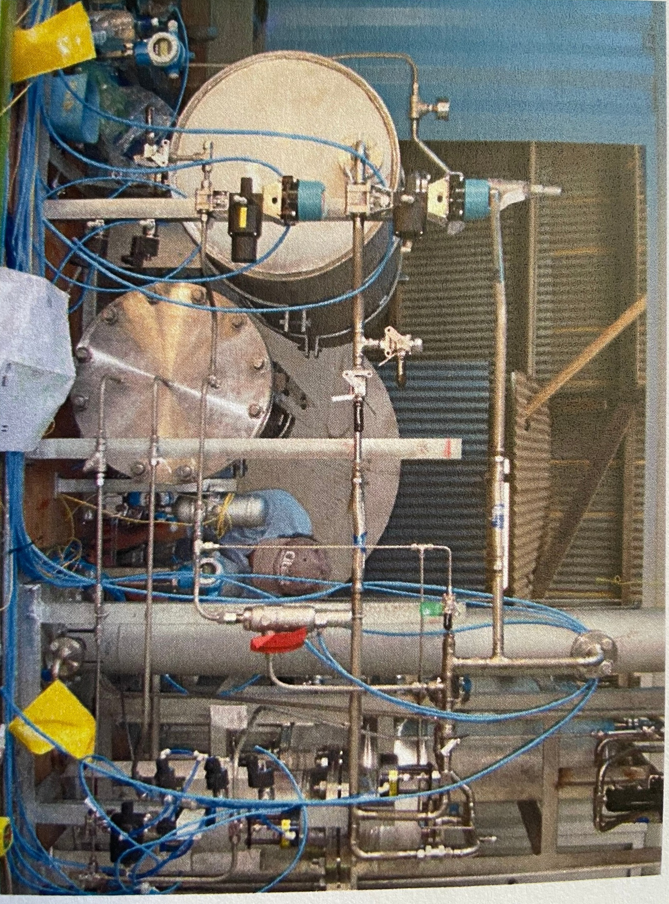 Stainless tanks, piping and instrumentation with blue pneumatic tubing