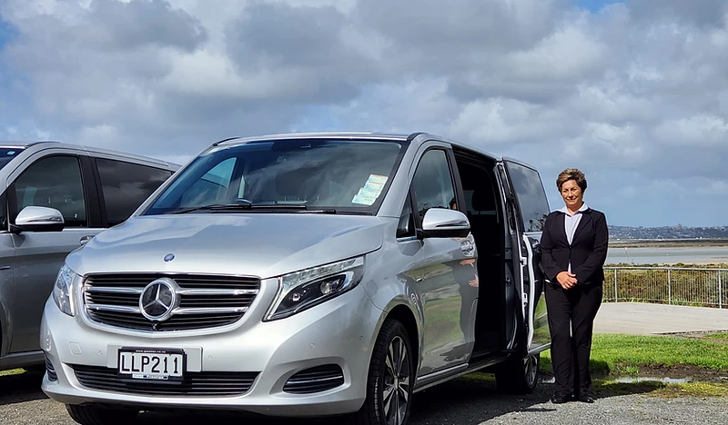 Tania Jeffs, founder of YourNZDriver, beside her Mercedes-Benz van