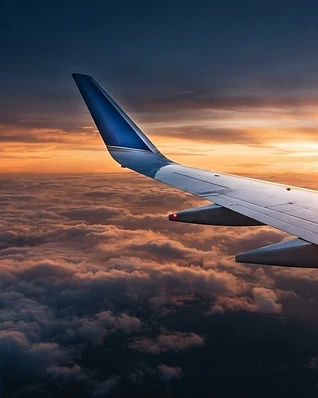 Luxury private business jet cruising at golden hour