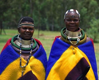 Two Ndebele women in full traditional dress