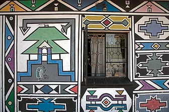 Ndebele mural wall with a window and a figurative motif, by Clint Strydom