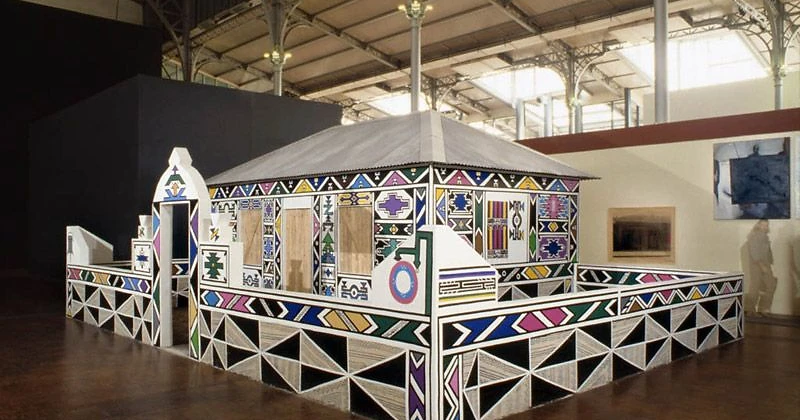 Dr Esther Mahlangu's painted Ndebele house installation at Les Magiciens de la Terre, Grande Halle de la Villette, Paris, 1989