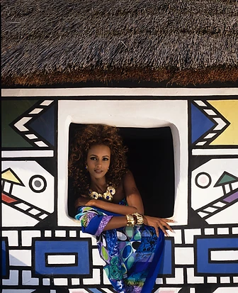 Iman posing in the window of an Ndebele house at Botshabelo, 1991