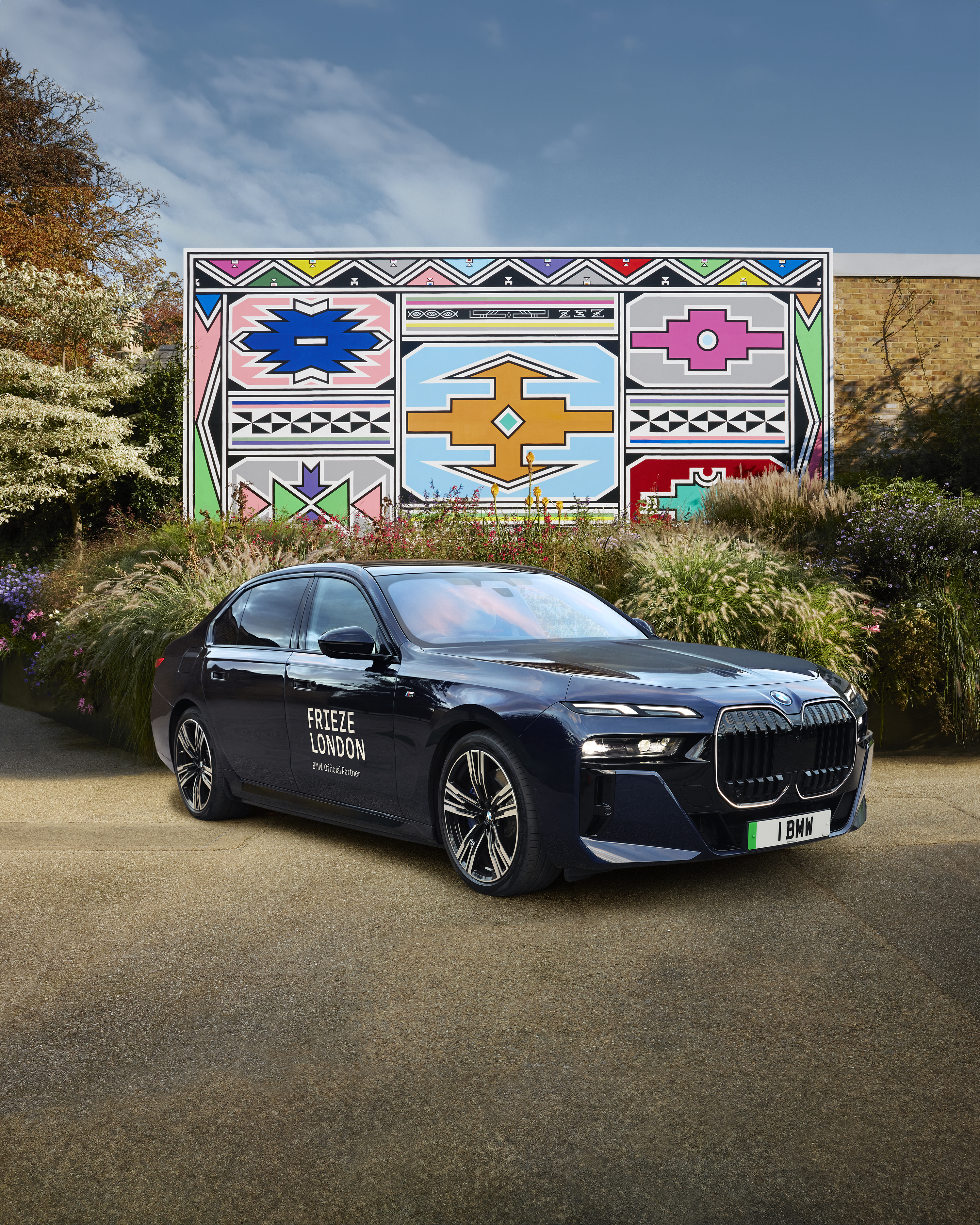 The BMW i7 before Dr Esther Mahlangu's Serpentine mural at Frieze London