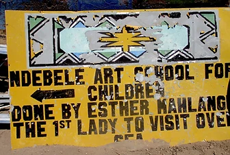 Weathered hand-painted Ndebele Art School for Children sign by Esther Mahlangu