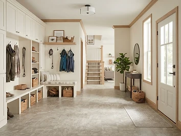 Vinyl flooring installed in a suburban Michigan entryway and mudroom by Quick Carpet