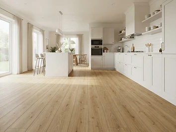 Light laminate wood-look flooring installed in a Sterling Heights kitchen by Quick Carpet