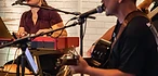 Worship team leading on stage