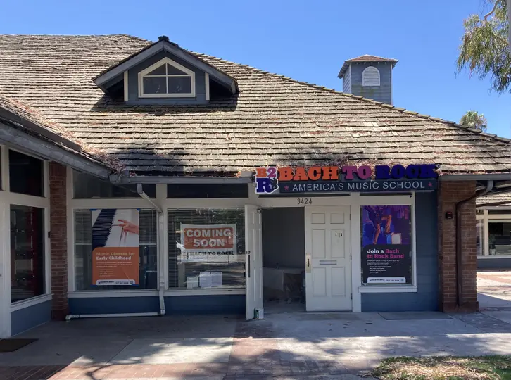 Music school storefront on Los Coyotes Diagonal in Long Beach, signage installed and space ready to open