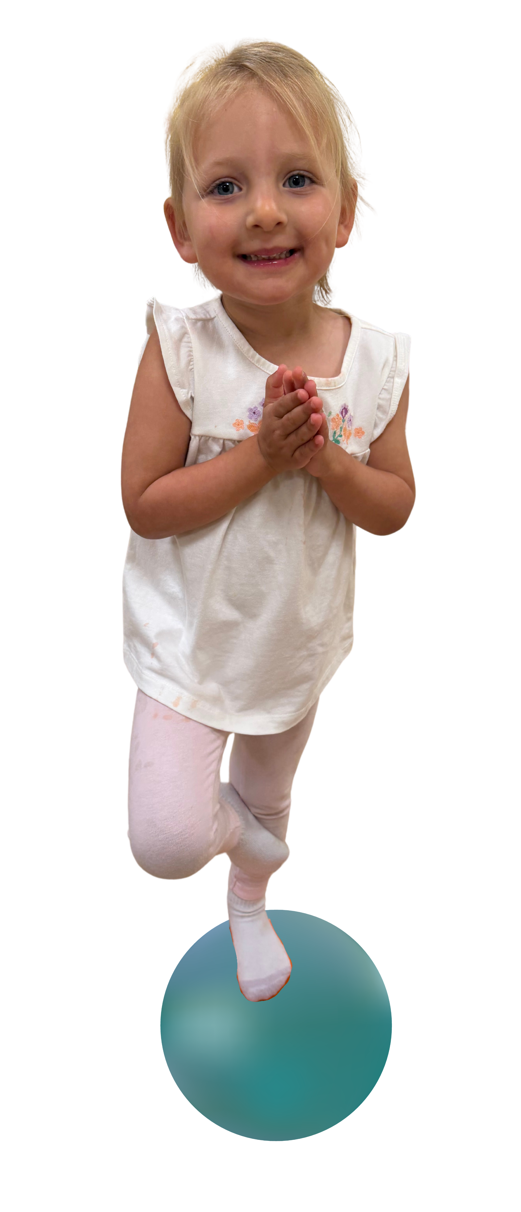 A child in a peaceful yoga pose