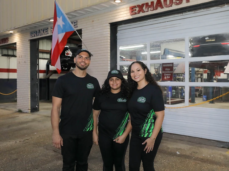 Versatile Automotive team members outside the shop