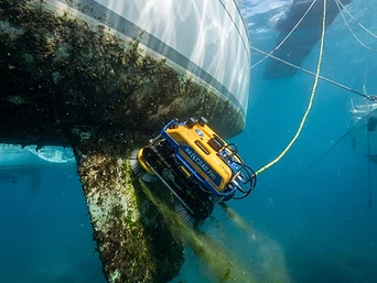 Robot operating solo along the keel, no diver required.