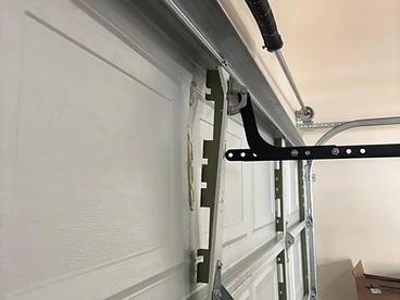 Garage door hinge and roller carrier repair in Fort Collins, Colorado