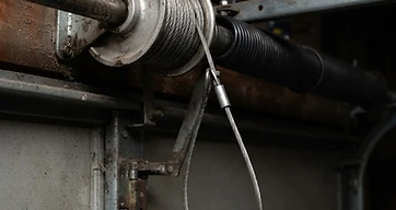 Garage Door Cable Came Off the Drum: Why It Happens and What to Do
