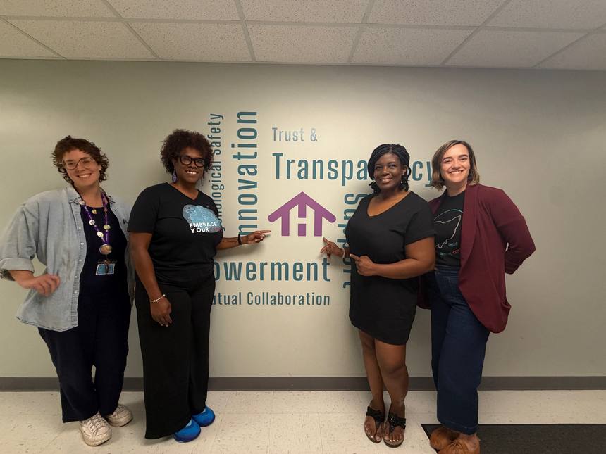 Standing with the Hope and Healing team at their offices