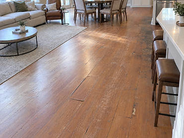 Open-plan living & dining flooring — before