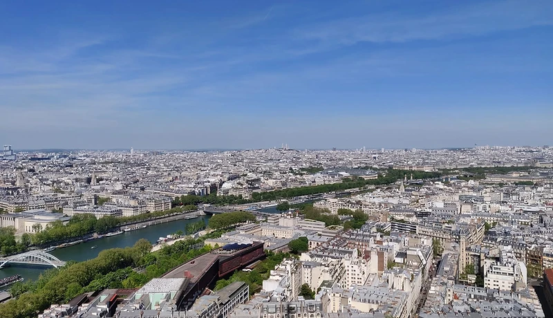 Panoramic view of Paris from above — the Seine, rooftops and skyline