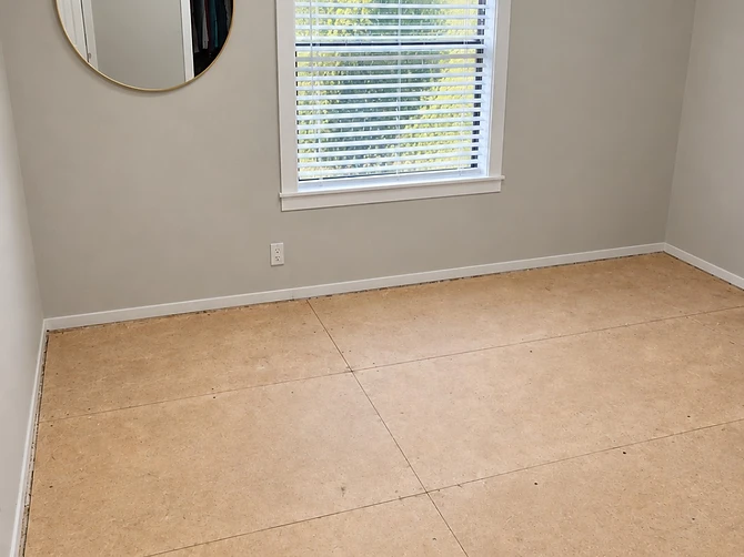 Bedroom subfloor prepared for new flooring installation