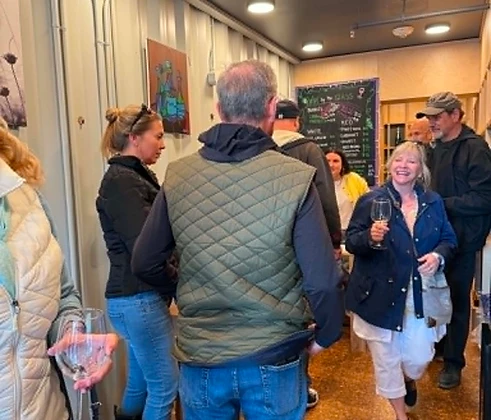 Friends gathering with wine at RTP Uncorked