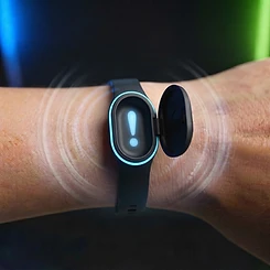 The Annoying Bracelet — the pod is open, holding white pills inside