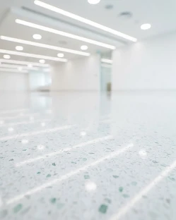 Burnished polished commercial floor reflecting overhead light