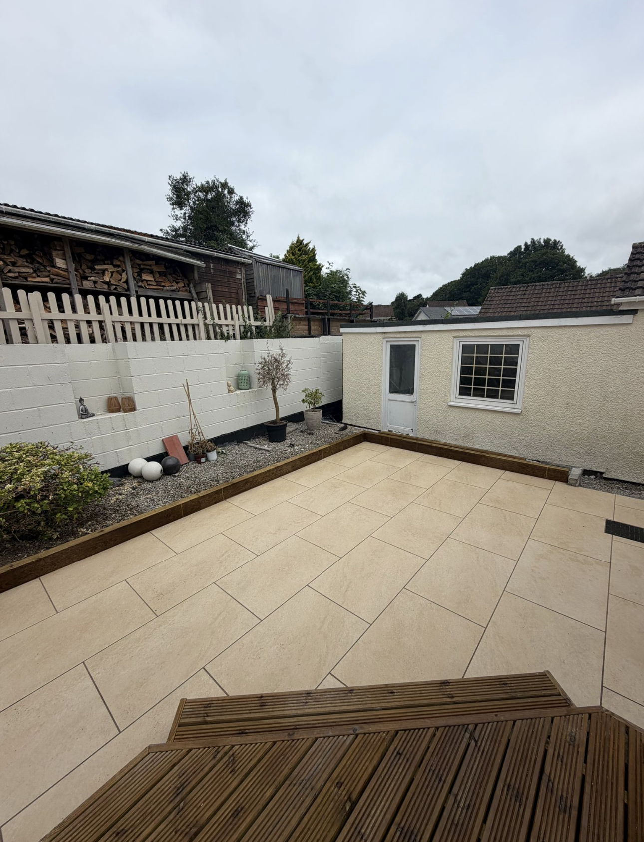 Completed patio with stone paving and timber decking