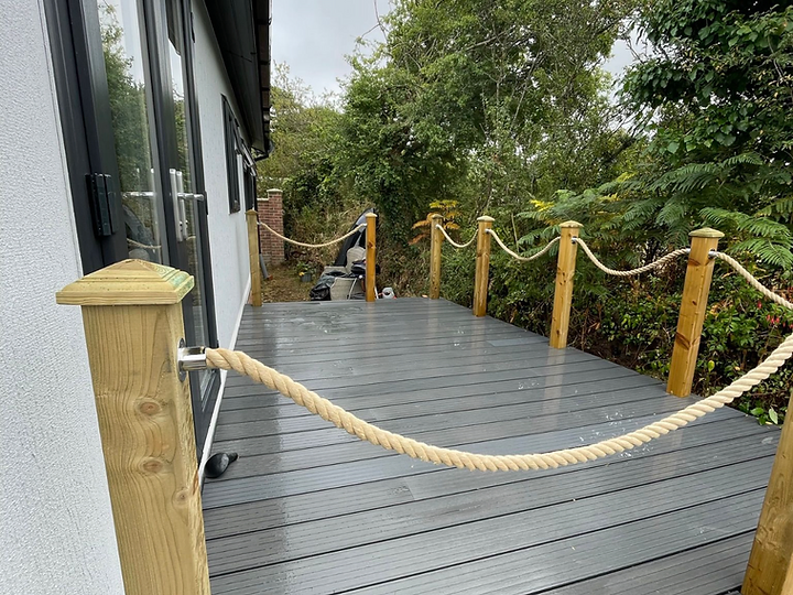 Composite decking with timber posts and rope balustrade