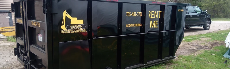 Tor Contracting 20-yard roll-off bin in front of a home
