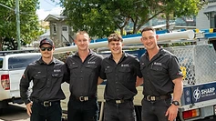 The Sharp Electrical & Air team — Max, Tom, Lucas and Adam — in front of the company service vehicle