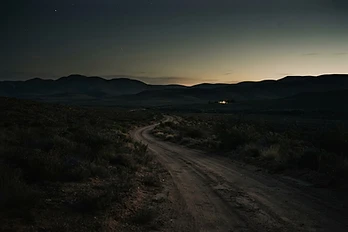 An empty Karoo road at dusk