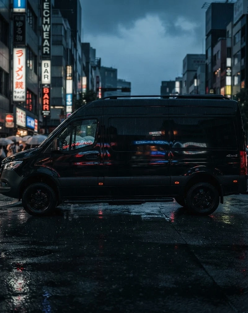 Sprinter van on a city street at dusk
