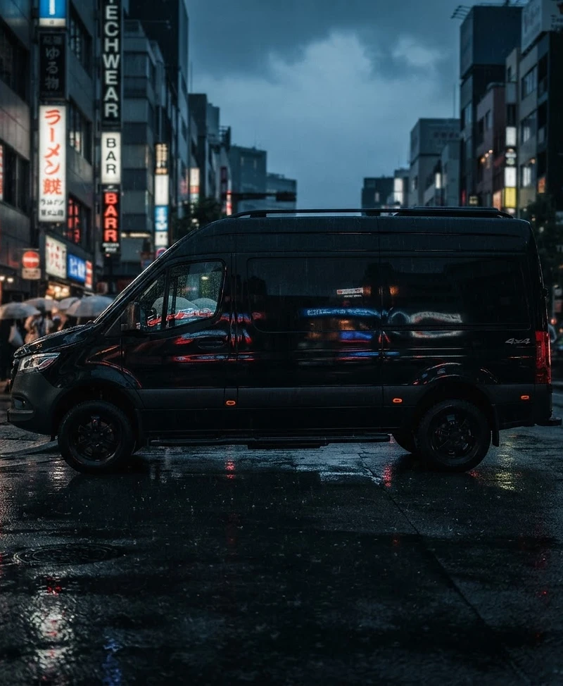 Sprinter van on a city street at dusk