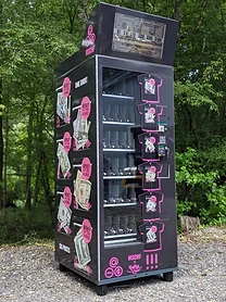 Matte black MSCHF x Rolling Loud custom vending machine with pink graphics