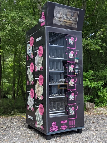 Matte black MSCHF x Rolling Loud custom vending machine with pink graphics