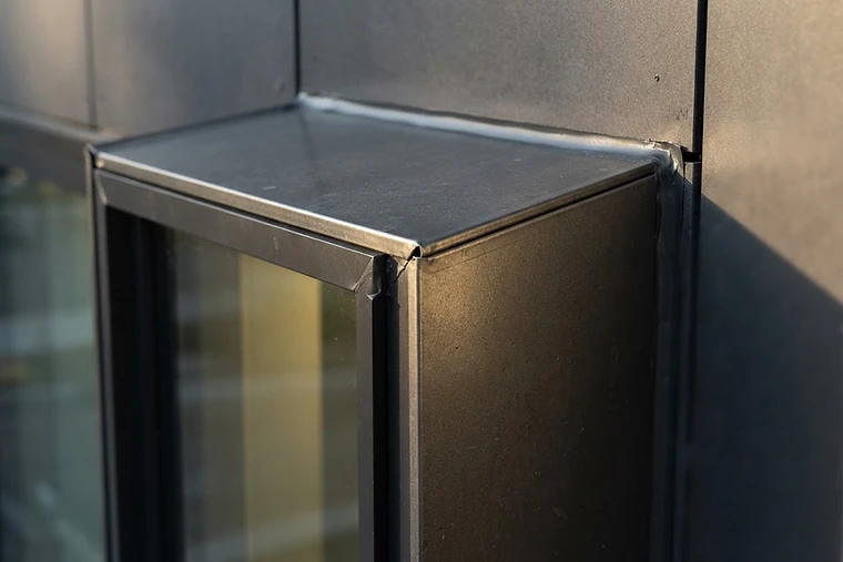 Precision custom metal window flashing detail