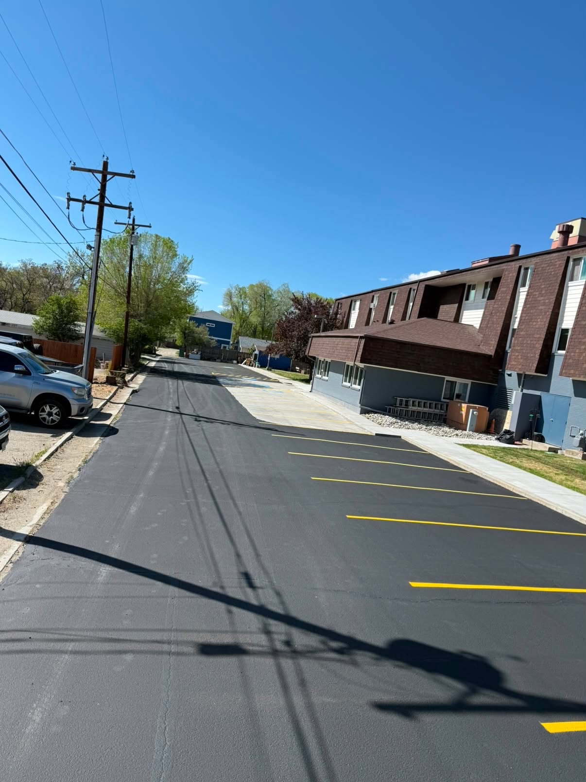 Commercial parking lot with freshly painted yellow stall lines