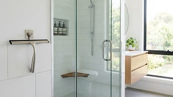 Use a squeegee to halve shower cleaning time