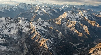 Mountain ranges stretching across a landscape.