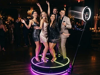 Milestone birthday hero shot — cinematic eye-level orbit on the LED platform.