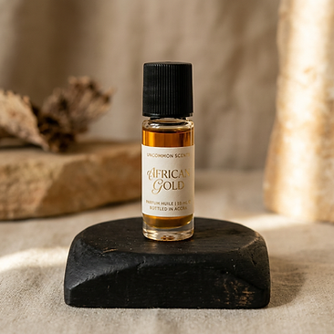 Uncommon Scents African Gold inspired fragrance oil roller bottle