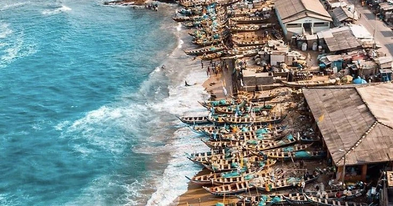 Cape Coast Castle and the canoes