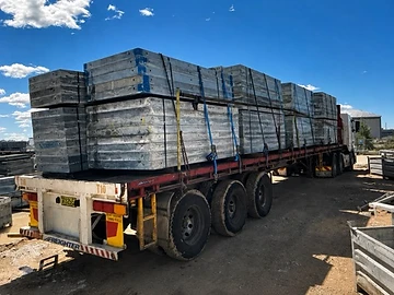 CD & Sons Transport freighter trailer loaded with formwork panels