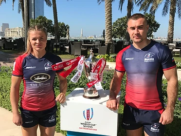 Russian Rugby 7s players posing with the HSBC Rugby Sevens World Cup trophy in San Francisco in official team apparel featuring Club Blazers sponsorship.