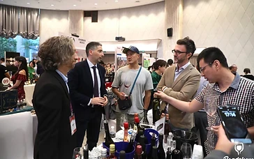 Wine export manager reviewing import documentation and qualification checklists for Chinese wine buyers