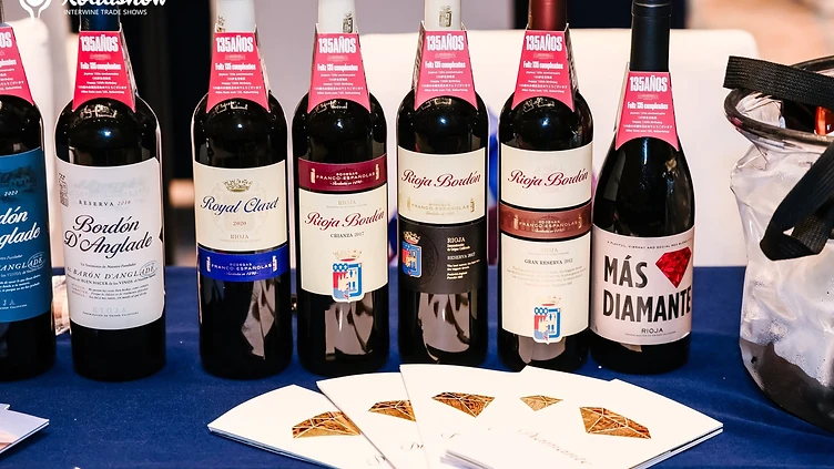 Wine producers and professional wine buyers conducting business meetings at Interwine China in Guangzhou